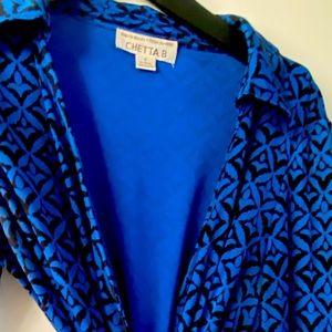 Beautiful blue and black wrap dress. Knee length. Size 8